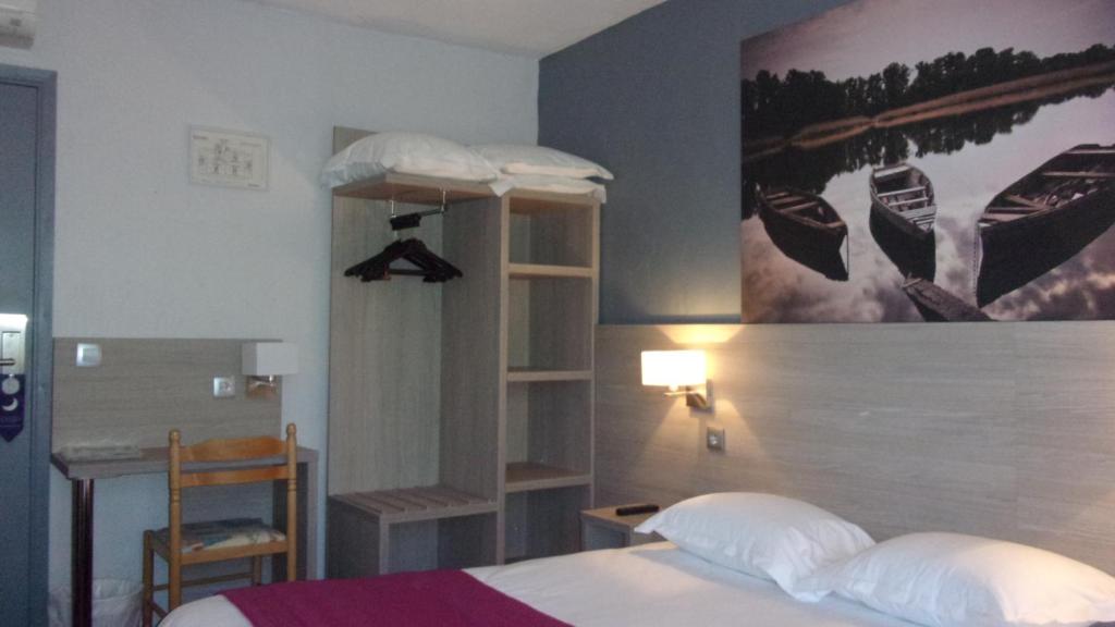 Postel nebo postele na pokoji v ubytování Atoll Hotel restaurant