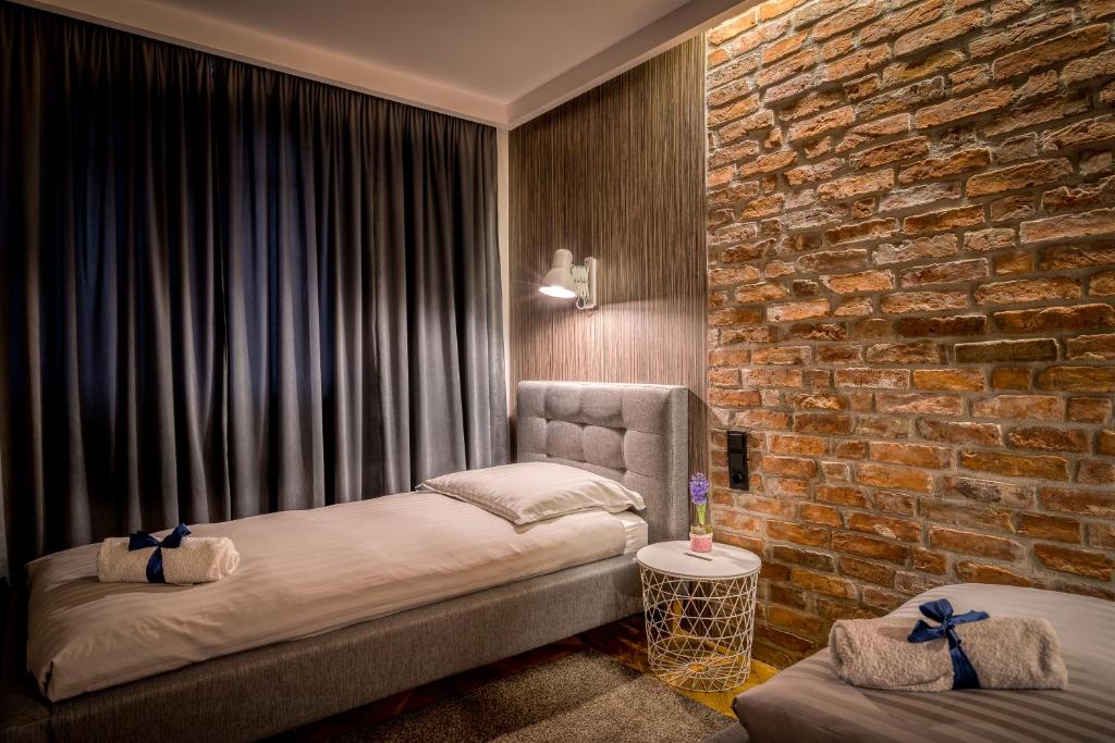 Posteľ alebo postele v izbe v ubytovaní Grelewicz Apartments-MyPlace