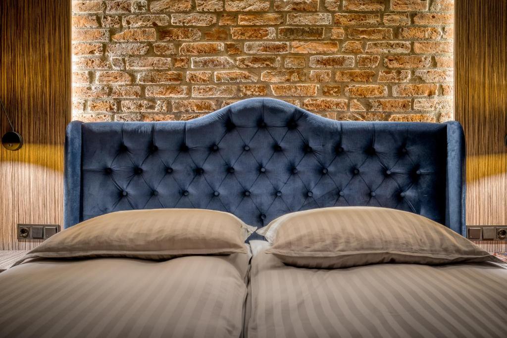 Posteľ alebo postele v izbe v ubytovaní Grelewicz Apartments-MyPlace