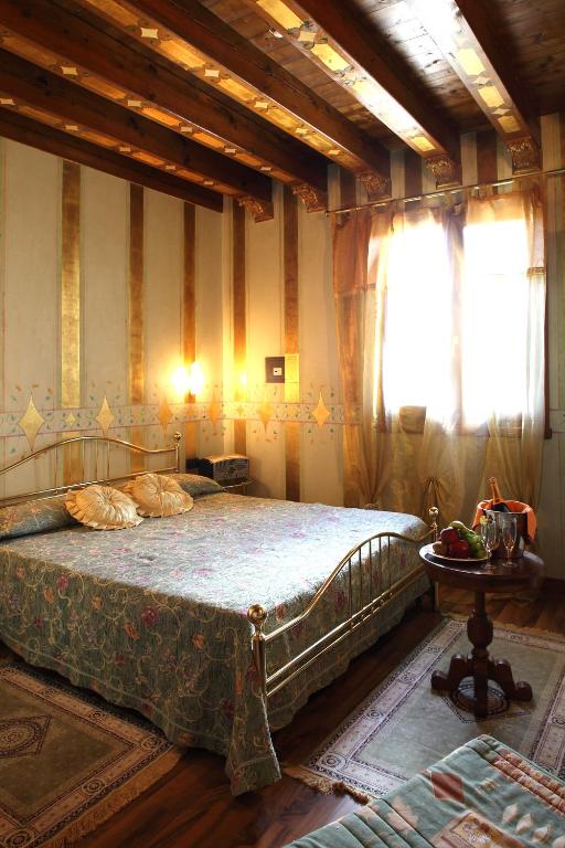 Postel nebo postele na pokoji v ubytování Hotel Tabina