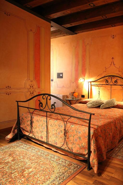 Postel nebo postele na pokoji v ubytování Hotel Tabina