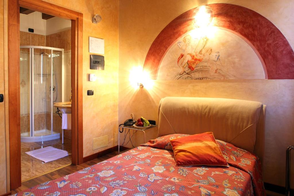 Postel nebo postele na pokoji v ubytování Hotel Tabina