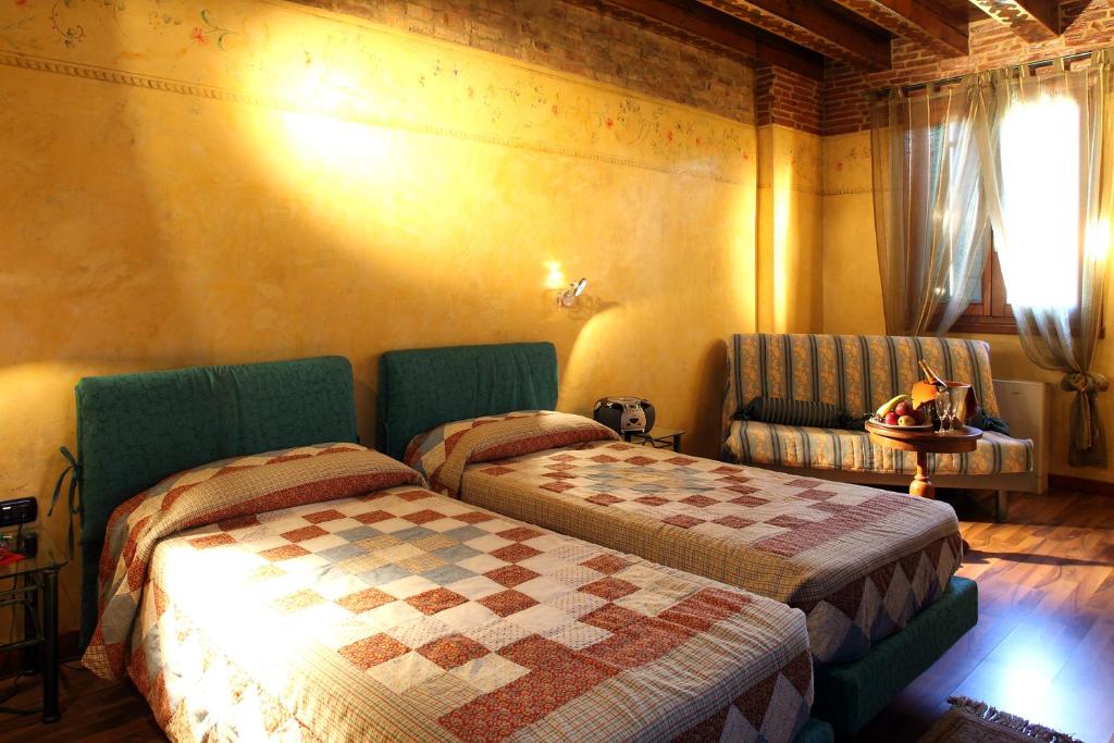 Postel nebo postele na pokoji v ubytování Hotel Tabina