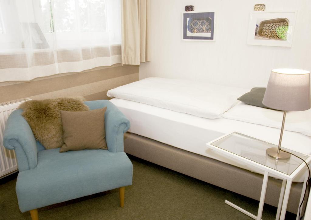 Postel nebo postele na pokoji v ubytování Hotel Auszeit