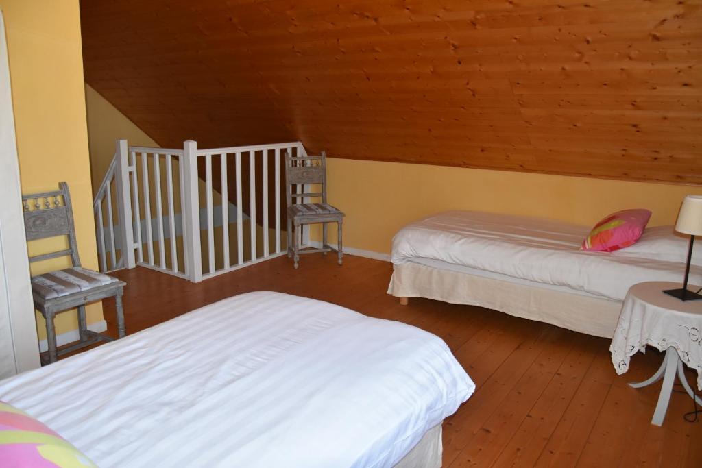 Postel nebo postele na pokoji v ubytování Le Tilleul de Ray