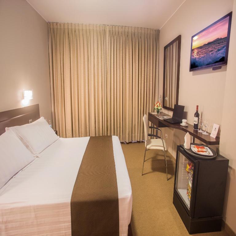 Postel nebo postele na pokoji v ubytování Del Pilar Miraflores Hotel