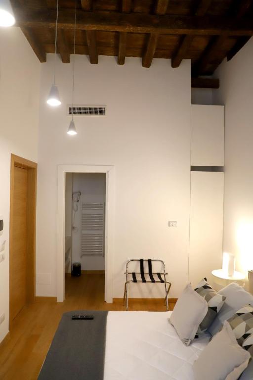 Postel nebo postele na pokoji v ubytování Vista Borgo Antico
