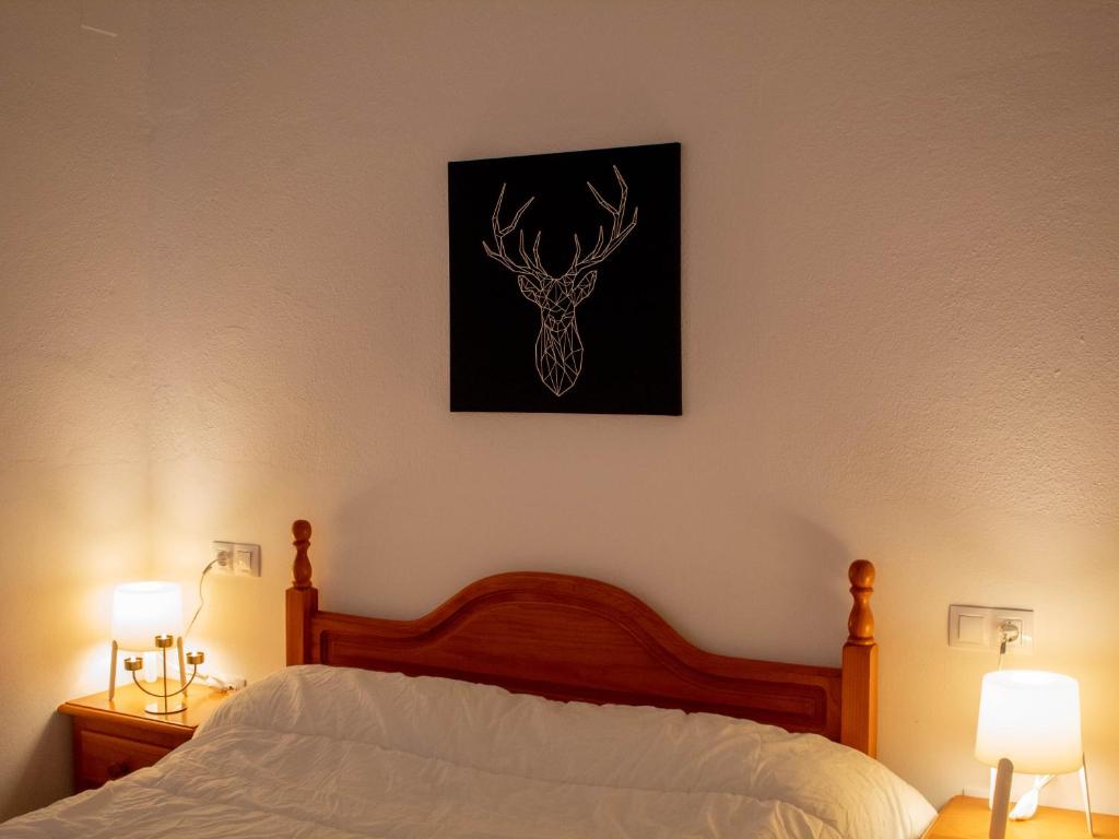 Postel nebo postele na pokoji v ubytování Stay Wild en Las Casitas de Huerta Arriba