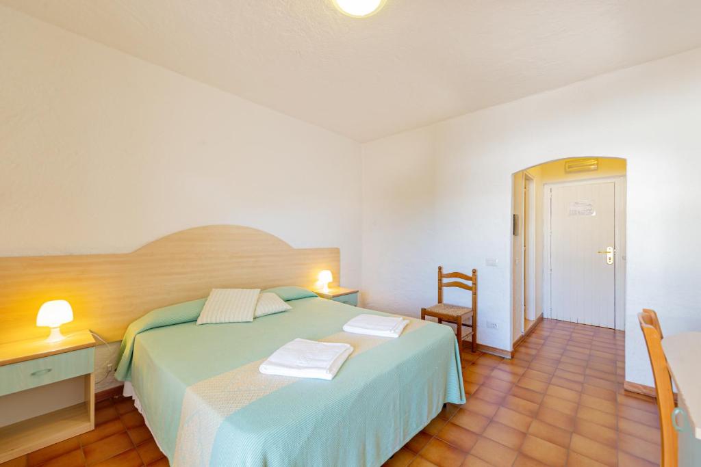 Postel nebo postele na pokoji v ubytování Hotel Mare Blue