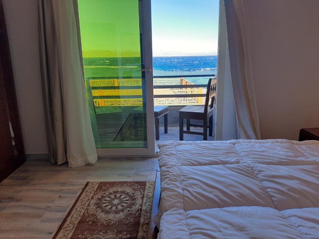 Postel nebo postele na pokoji v ubytování Diamond Dahab House