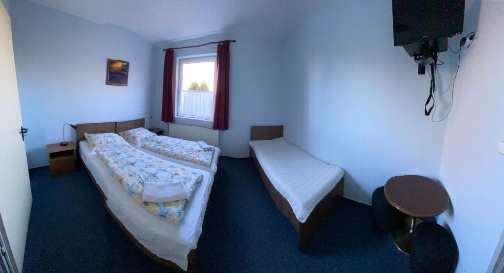 Postel nebo postele na pokoji v ubytování Panama Motel