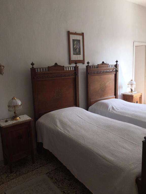Postel nebo postele na pokoji v ubytování B&B Casa Pirona