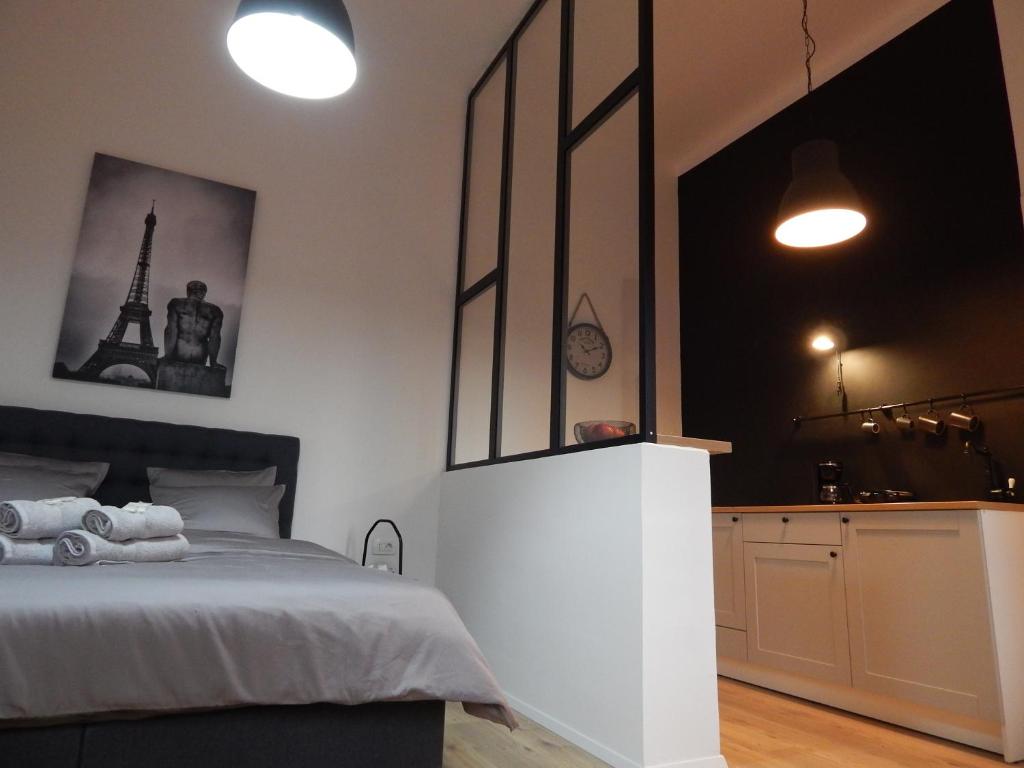 Posteľ alebo postele v izbe v ubytovaní Gold Rooms and Suite