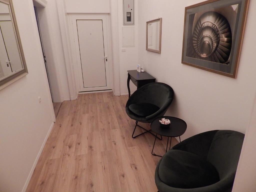 Posedenie v ubytovaní Gold Rooms and Suite