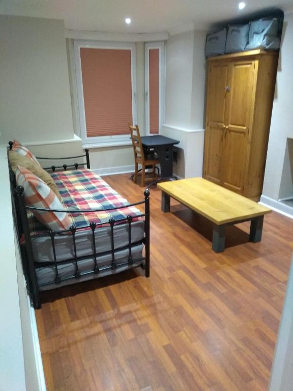 Postel nebo postele na pokoji v ubytování 8A Kenilworth Road