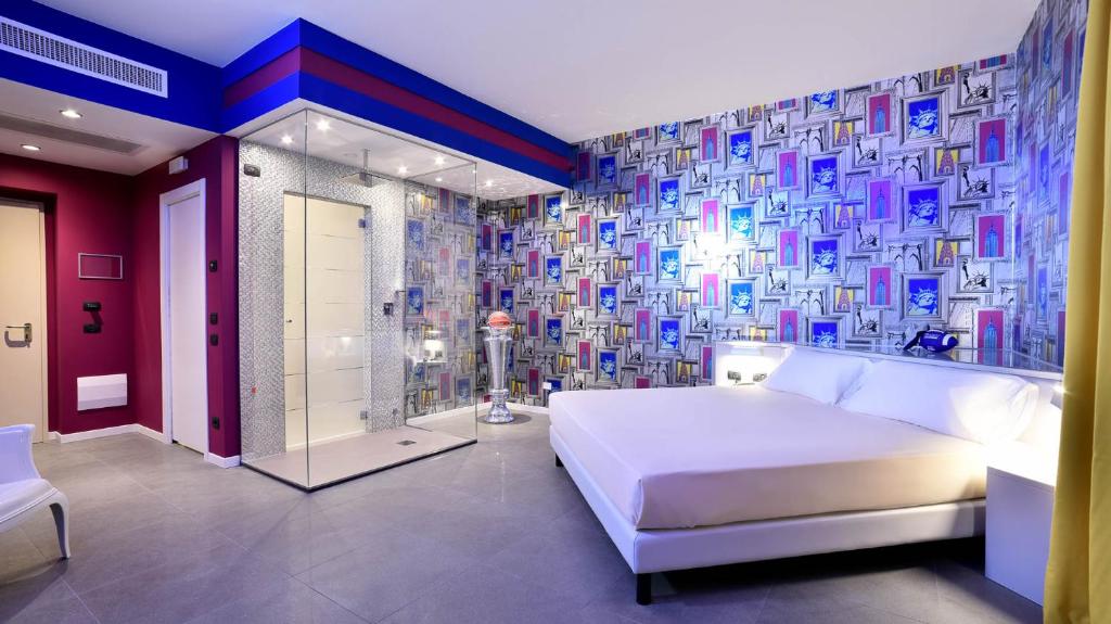 Postel nebo postele na pokoji v ubytování Sweet Motel