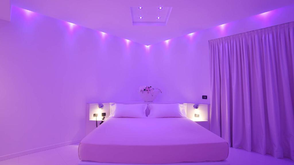 Postel nebo postele na pokoji v ubytování Sweet Motel