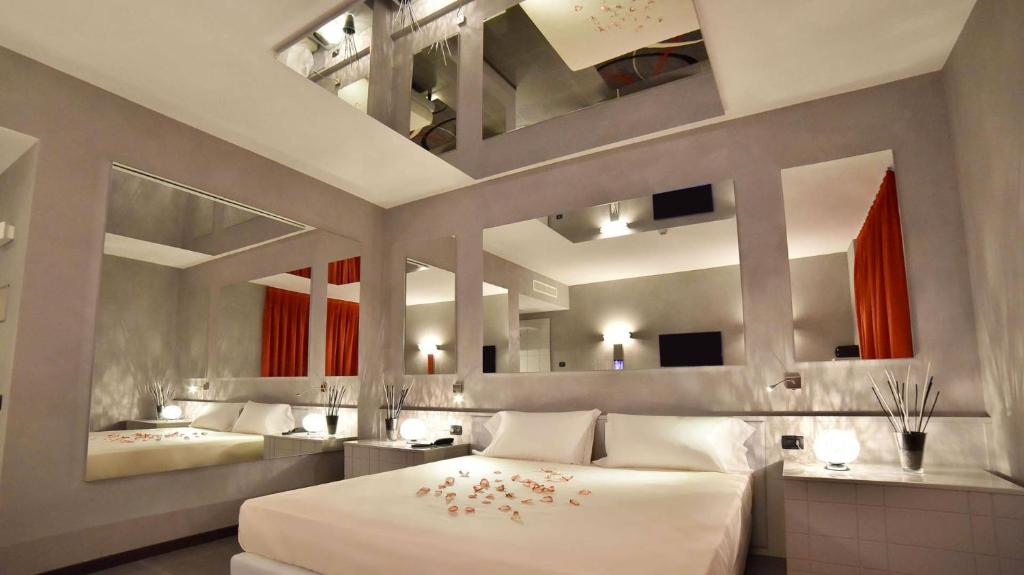 Postel nebo postele na pokoji v ubytování Sweet Motel