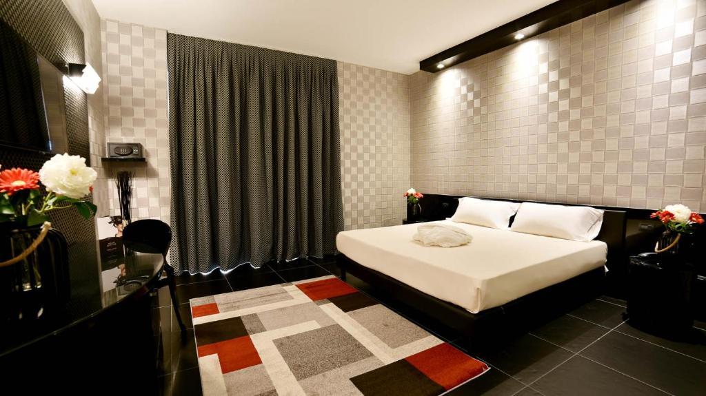 Postel nebo postele na pokoji v ubytování Sweet Motel