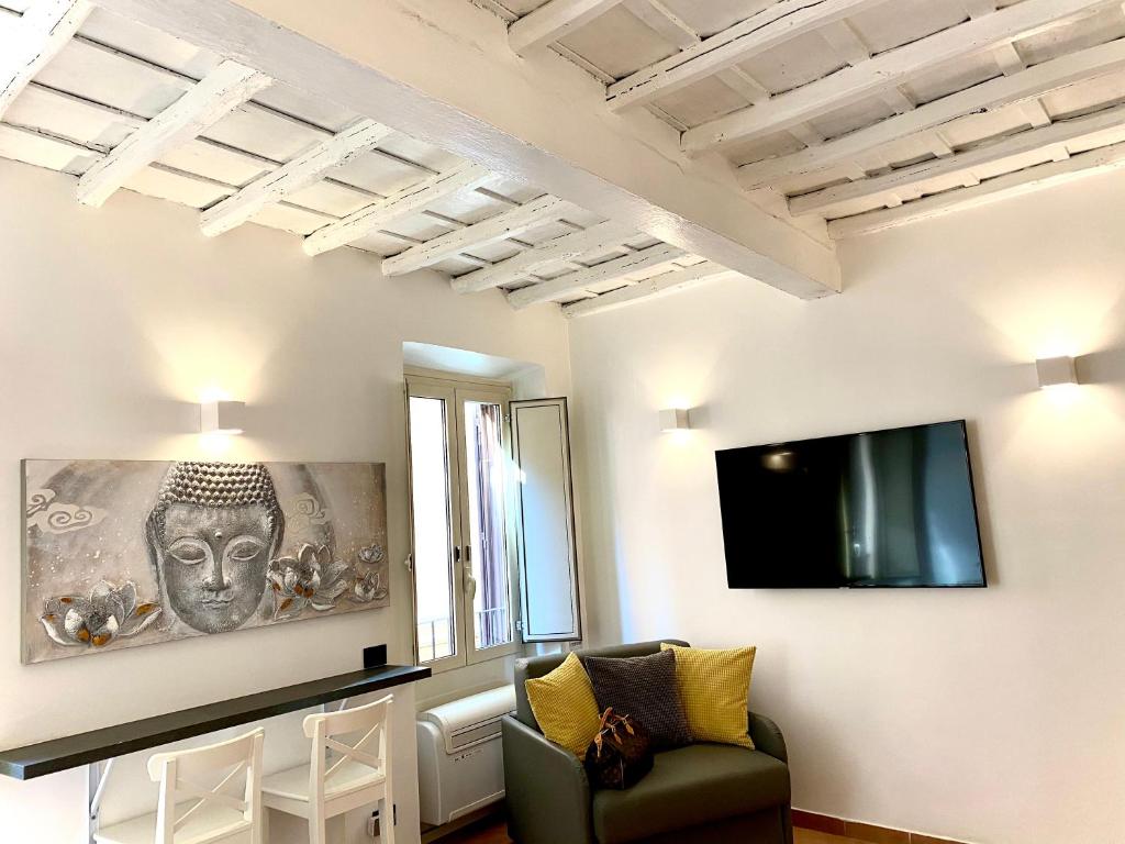 Telewizja i/lub zestaw kina domowego w obiekcie Palace Fontana di Trevi loft