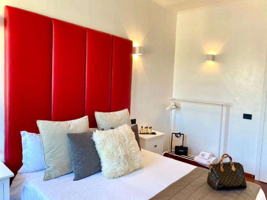 Łóżko lub łóżka w pokoju w obiekcie Palace Fontana di Trevi loft