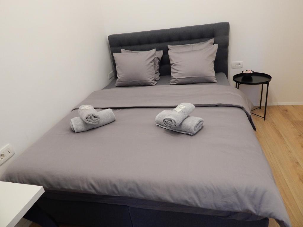 Posteľ alebo postele v izbe v ubytovaní Gold Rooms and Suite
