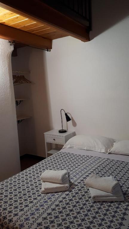 Postel nebo postele na pokoji v ubytování La Ginestra
