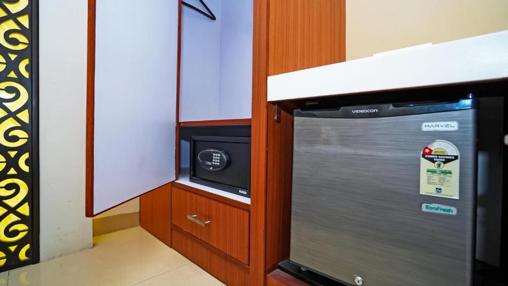 Kuchyň nebo kuchyňský kout v ubytování Hotel Pooja Palace