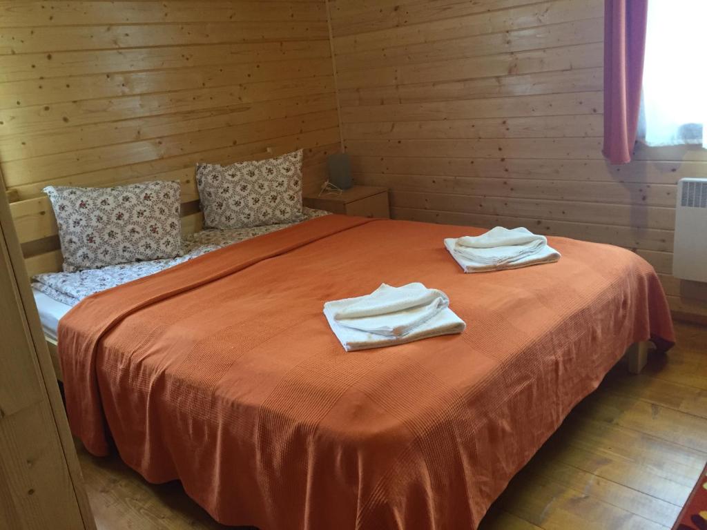 Postel nebo postele na pokoji v ubytování Nimfa Apartments