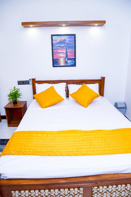 Postel nebo postele na pokoji v ubytování Seven Rich Villa