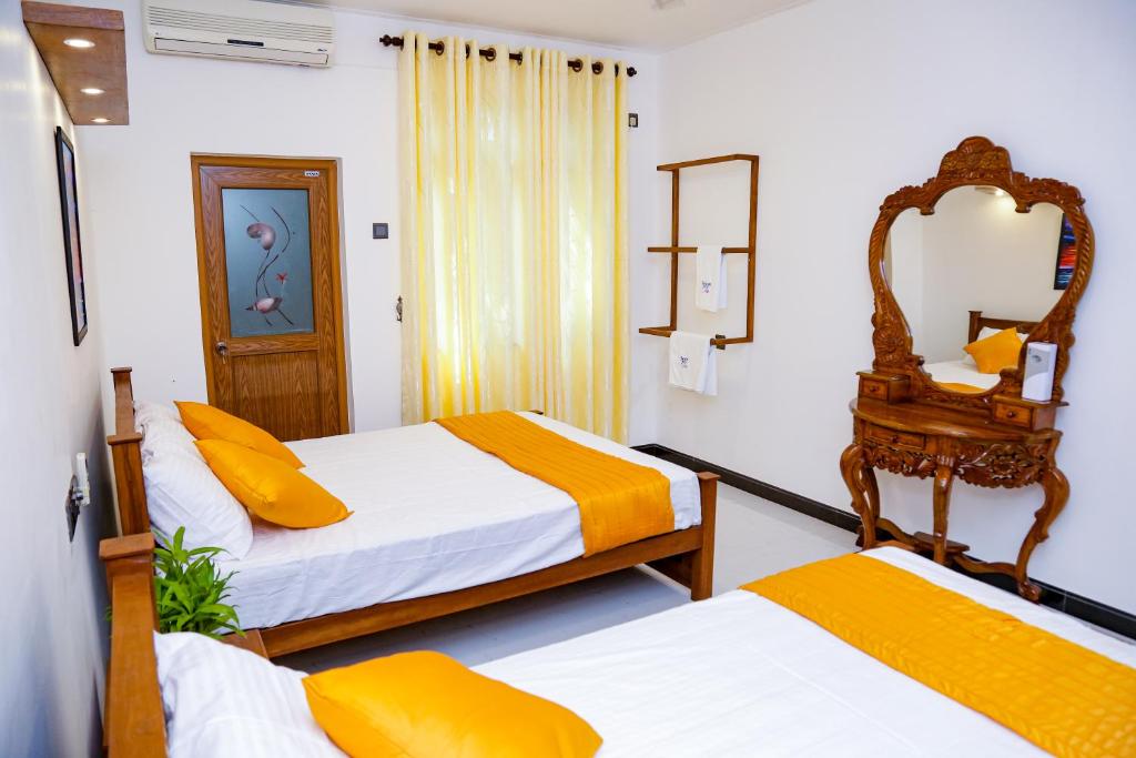 Postel nebo postele na pokoji v ubytování Seven Rich Villa