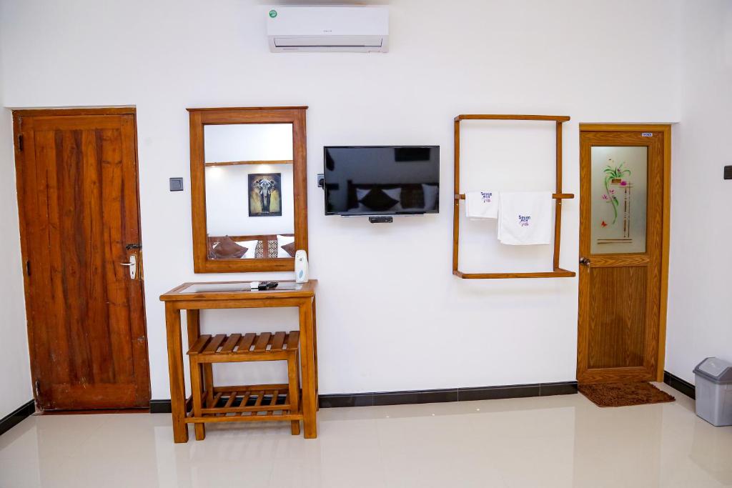 TV a/nebo společenská místnost v ubytování Seven Rich Villa