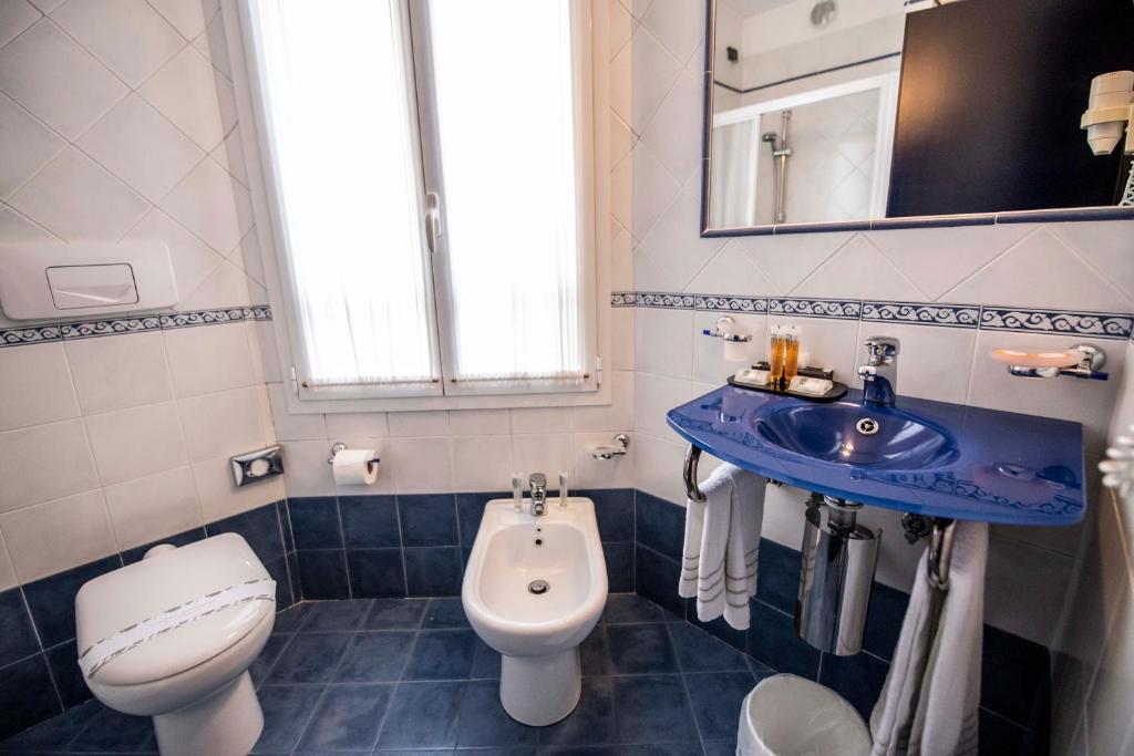 Koupelna v ubytování Hotel Estense