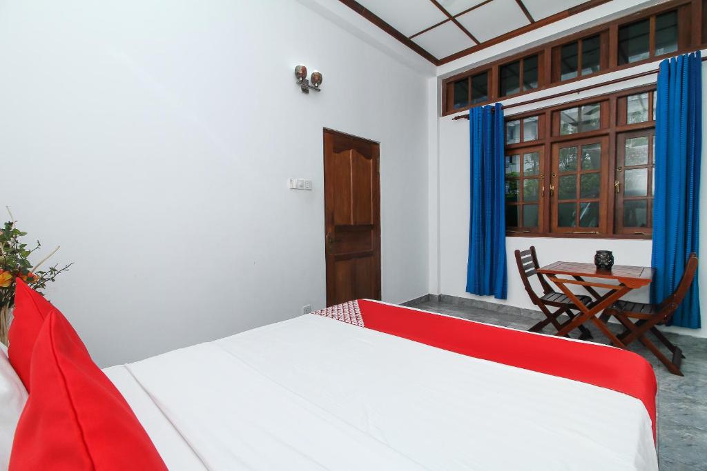 Postel nebo postele na pokoji v ubytování Leo's Home Stay