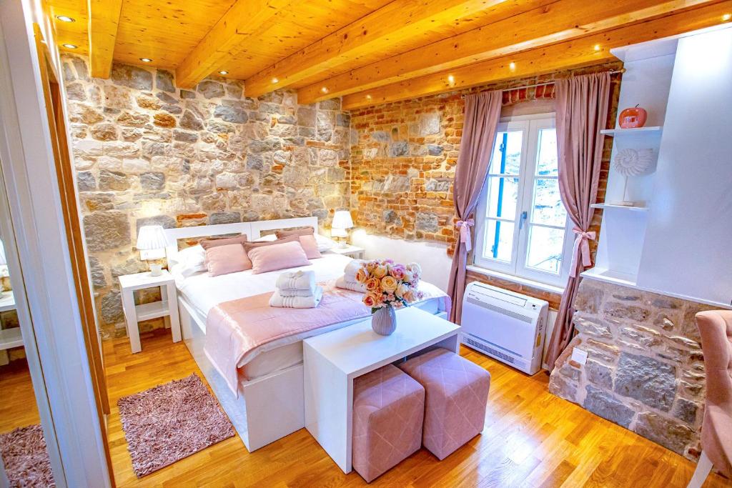 Postel nebo postele na pokoji v ubytování New Lux Villa Merissima