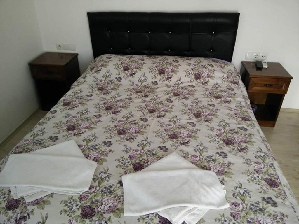 Postel nebo postele na pokoji v ubytování Hotel Uygar
