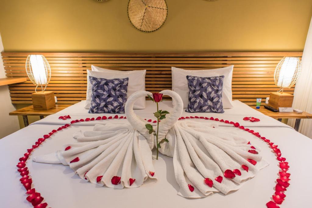 Postel nebo postele na pokoji v ubytování Pangkung Sari Bed and Breakfast
