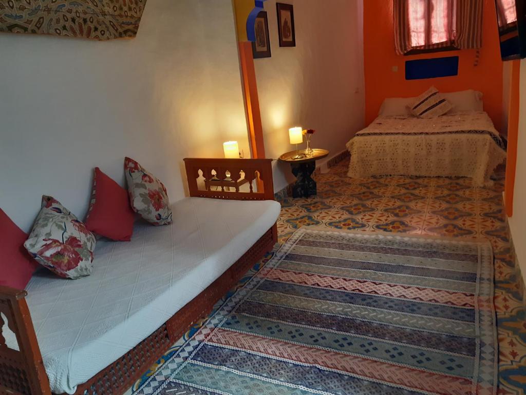Uma cama ou camas num quarto em Hotel Casa Miguel