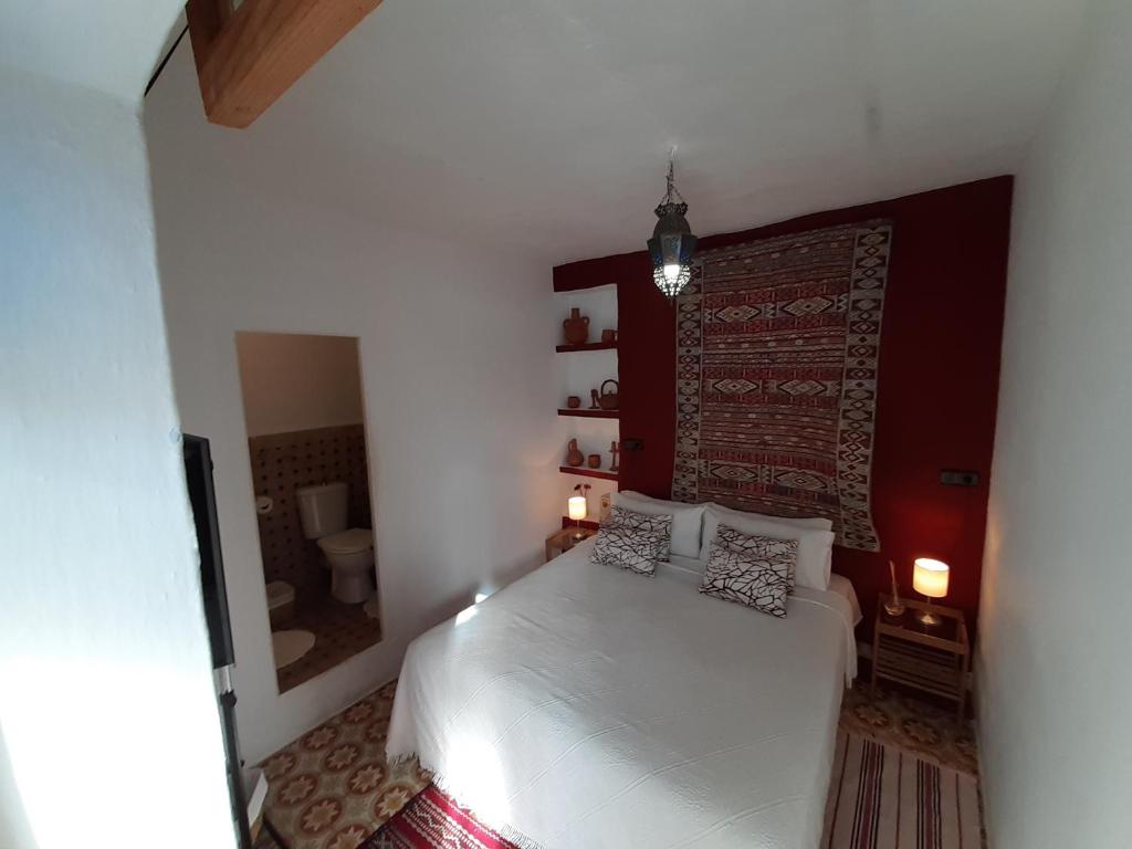 Uma cama ou camas num quarto em Hotel Casa Miguel