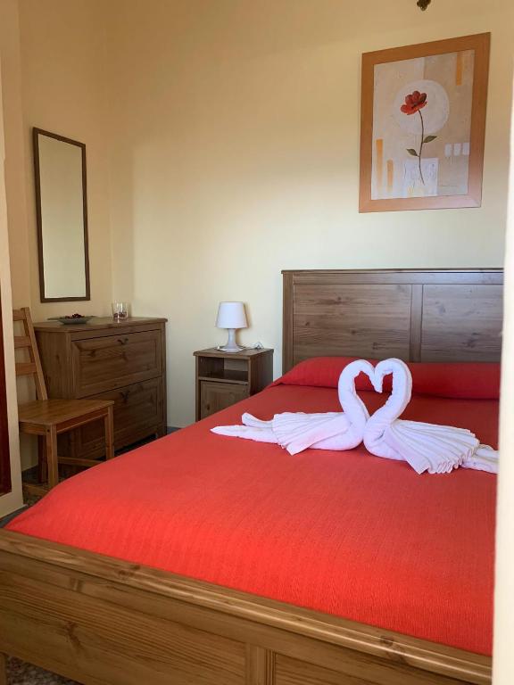 Postel nebo postele na pokoji v ubytování Apartamentos Domínguez