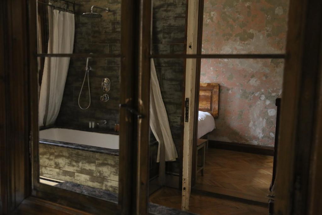 Postel nebo postele na pokoji v ubytování Brody House - boutique hotel