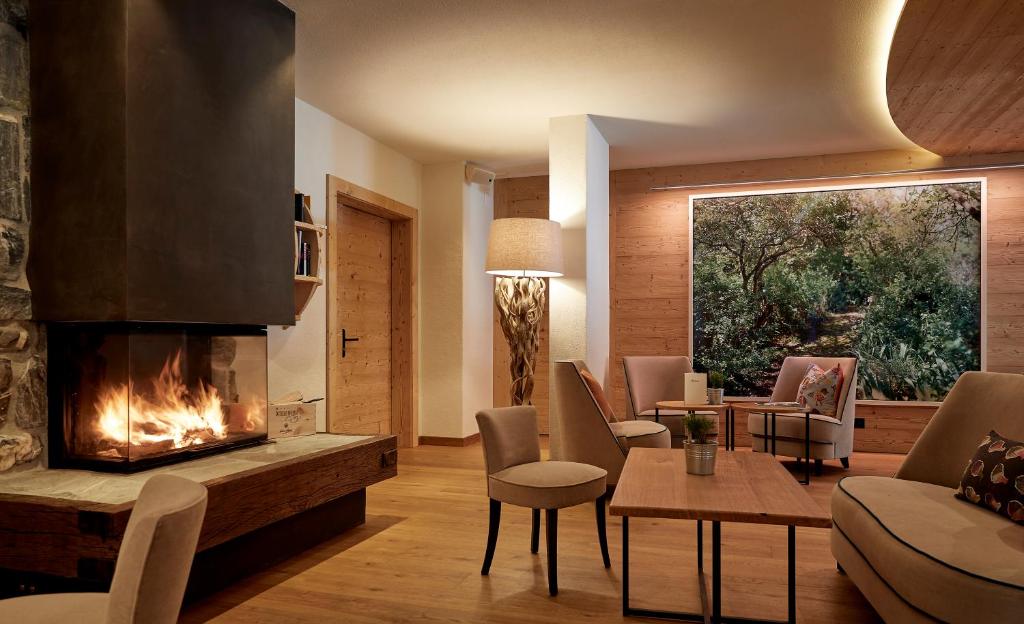 Posezení v ubytování Hotel Alpenland