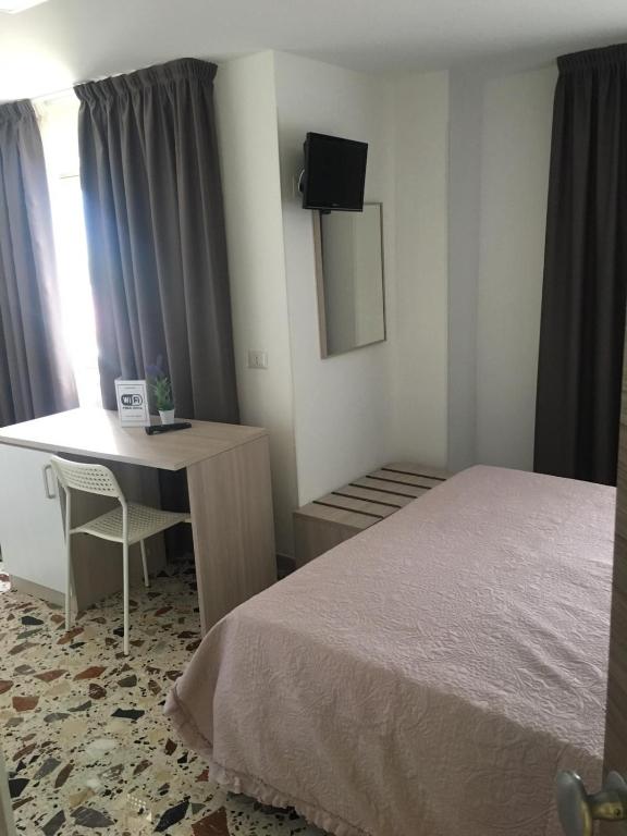 Postel nebo postele na pokoji v ubytování Piccolo Hotel Lamezia