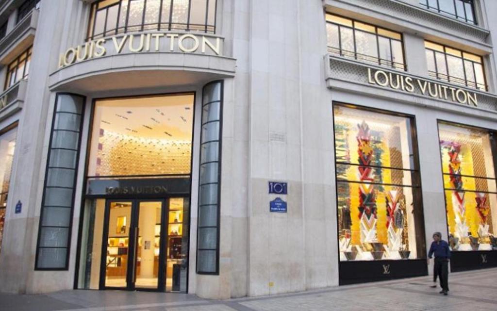 The Louis Vuitton Store Building On The Champs Elysees In Paris