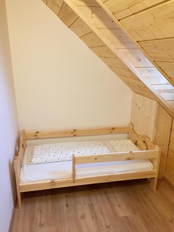 Letto o letti in una camera di Roubenka Ella