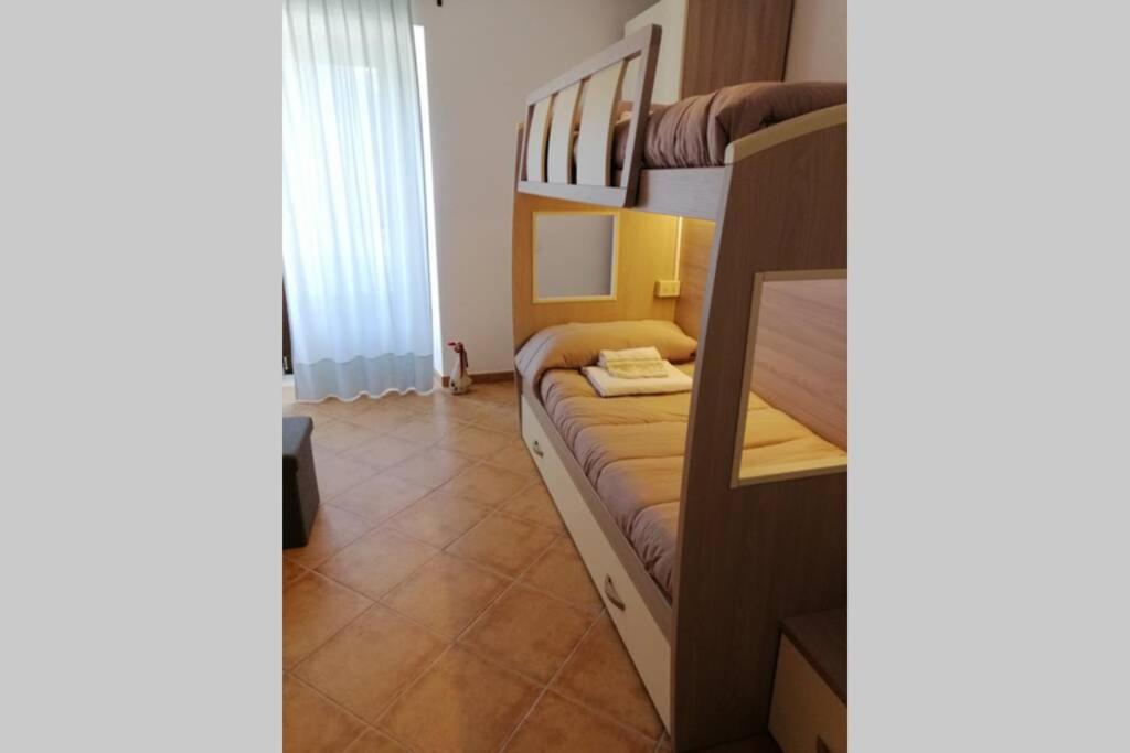 Postel nebo postele na pokoji v ubytování Casa Stefania
