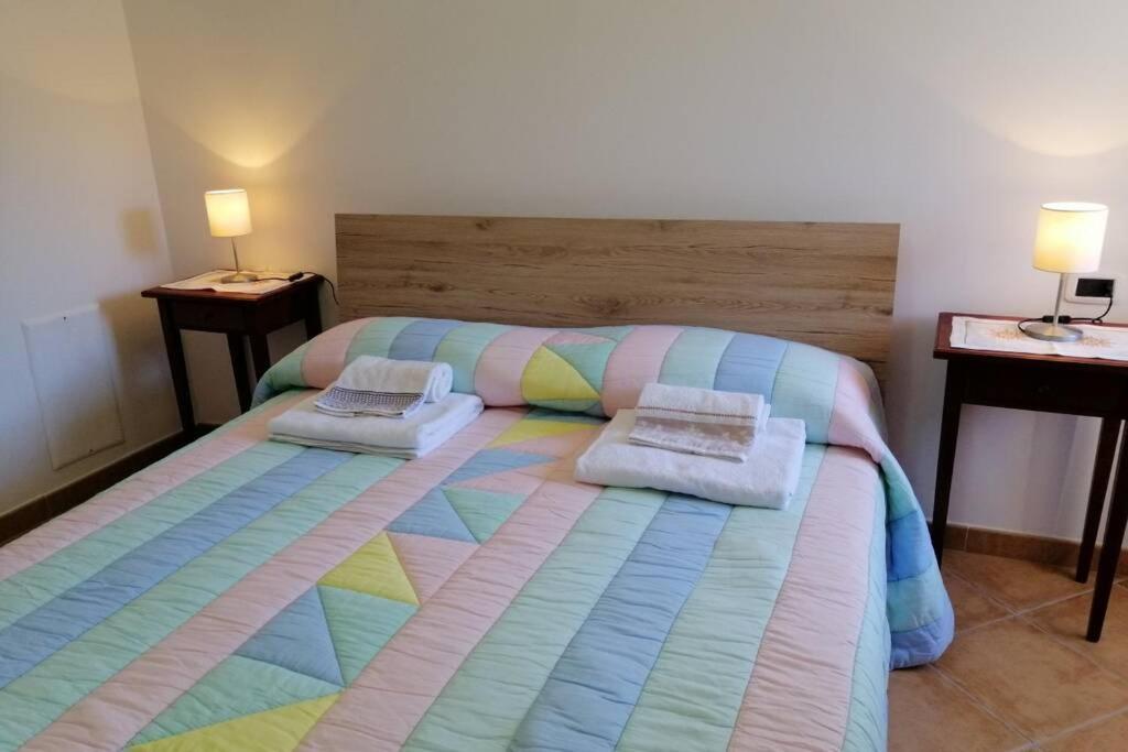 Postel nebo postele na pokoji v ubytování Casa Stefania