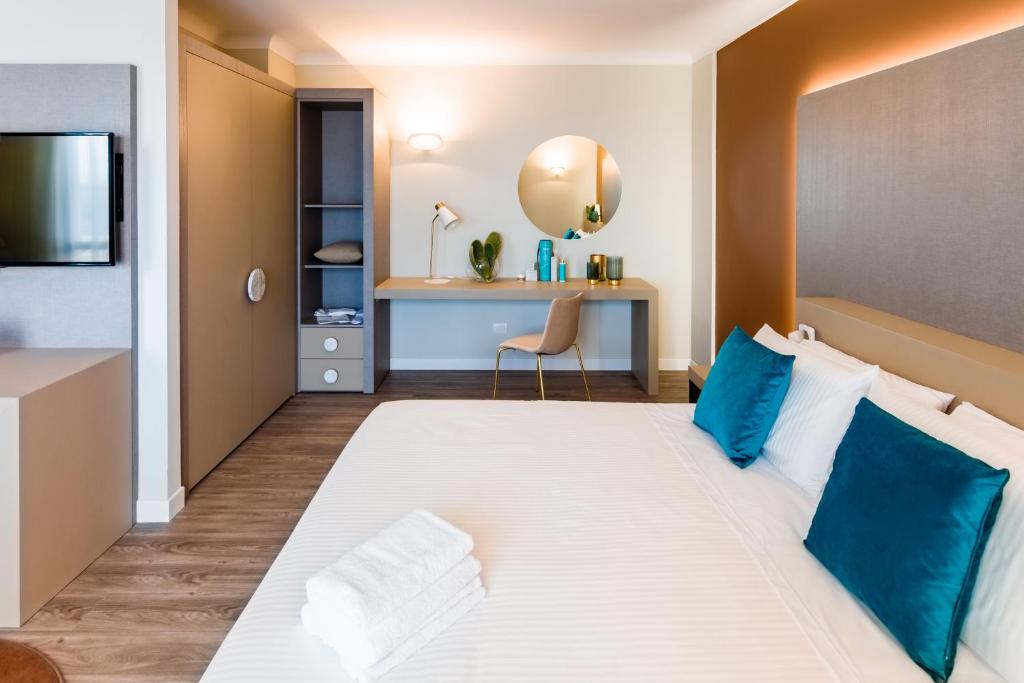 Postel nebo postele na pokoji v ubytování Seawater Hotel Bio & Beauty Spa