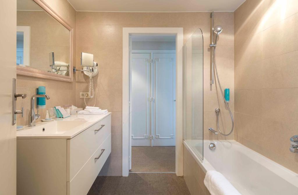 Koupelna v ubytování Hotel Lugano