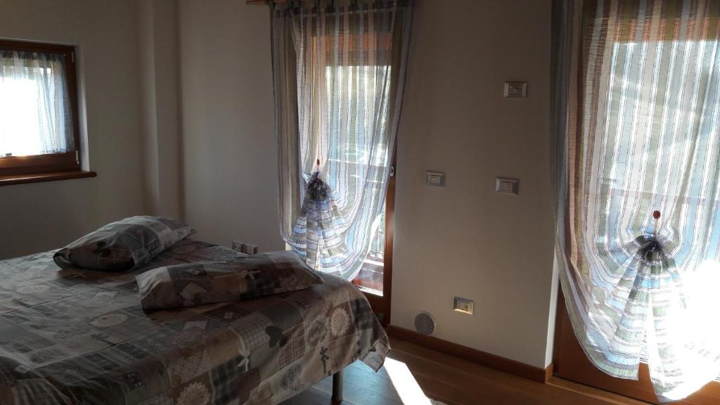 Postel nebo postele na pokoji v ubytování Casa Rosetta